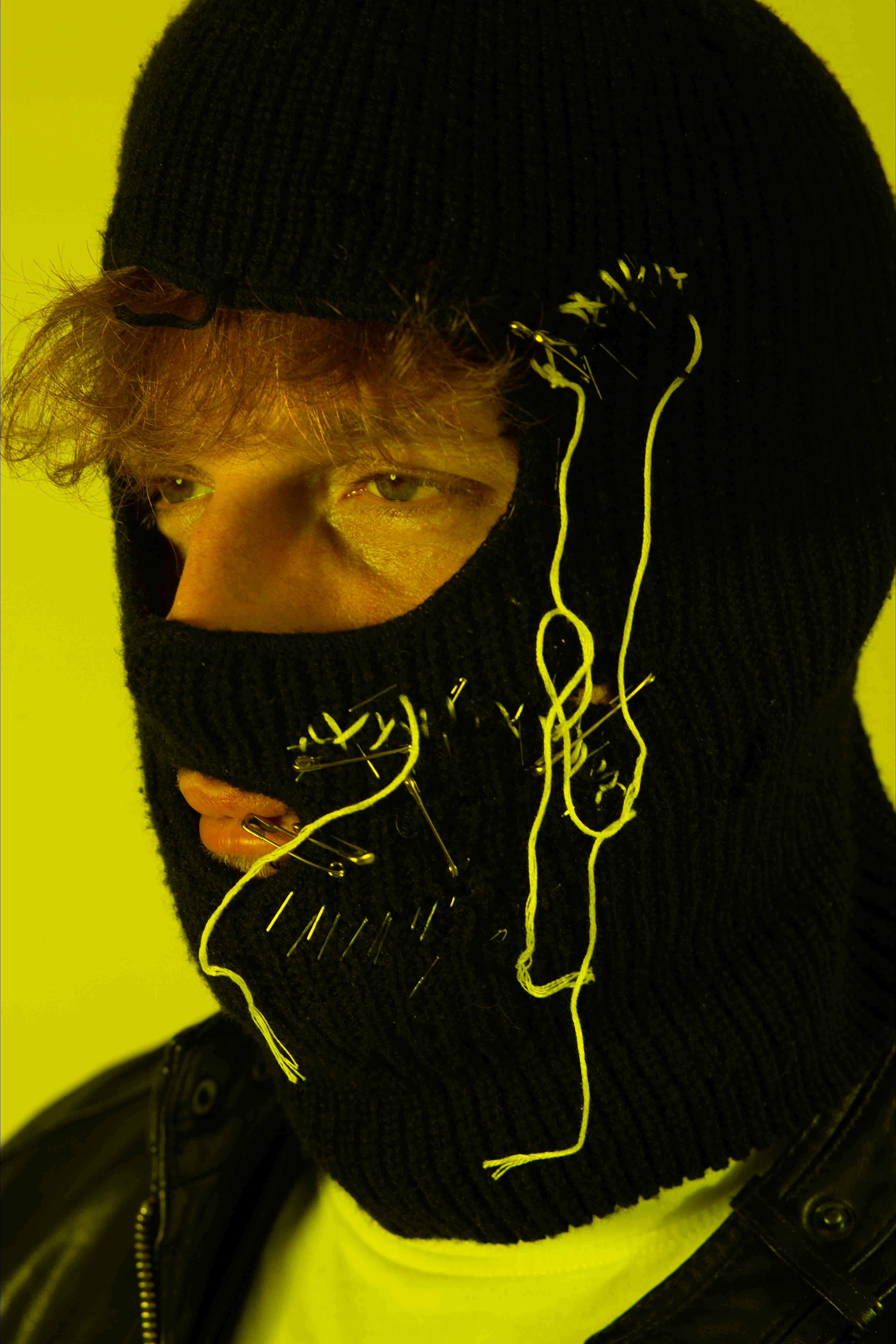 red hair under balaclaba